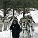 Cold-Weather Operations Course Class 18-06 students practice snowshoeing at Fort McCoy