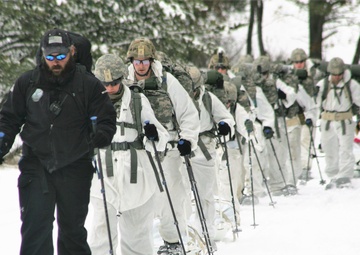 Photo Essay: Cold-Weather Operations Course Class 18-06 students practice snowshoeing at Fort McCoy