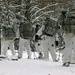 Cold-Weather Operations Course Class 18-06 students practice snowshoeing at Fort McCoy