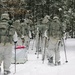 Cold-Weather Operations Course Class 18-06 students practice snowshoeing at Fort McCoy