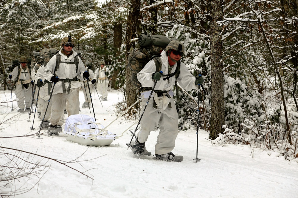 Cold-Weather Operations Course Class 18-06 students practice snowshoeing at Fort McCoy