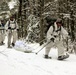 Cold-Weather Operations Course Class 18-06 students practice snowshoeing at Fort McCoy