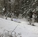 Cold-Weather Operations Course Class 18-06 students practice snowshoeing at Fort McCoy