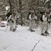 Cold-Weather Operations Course Class 18-06 students practice snowshoeing at Fort McCoy