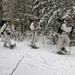 Cold-Weather Operations Course Class 18-06 students practice snowshoeing at Fort McCoy