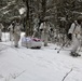 Cold-Weather Operations Course Class 18-06 students practice snowshoeing at Fort McCoy