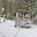 Cold-Weather Operations Course Class 18-06 students practice snowshoeing at Fort McCoy