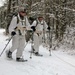 Cold-Weather Operations Course Class 18-06 students practice snowshoeing at Fort McCoy