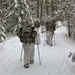 Cold-Weather Operations Course Class 18-06 students practice snowshoeing at Fort McCoy