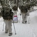 Cold-Weather Operations Course Class 18-06 students practice snowshoeing at Fort McCoy