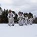 Cold-Weather Operations Course Class 18-06 students practice snowshoeing at Fort McCoy