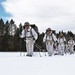 Cold-Weather Operations Course Class 18-06 students practice snowshoeing at Fort McCoy