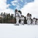 Cold-Weather Operations Course Class 18-06 students practice snowshoeing at Fort McCoy