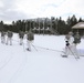 Cold-Weather Operations Course Class 18-06 students practice snowshoeing at Fort McCoy