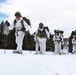 Cold-Weather Operations Course Class 18-06 students practice snowshoeing at Fort McCoy