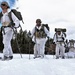 Cold-Weather Operations Course Class 18-06 students practice snowshoeing at Fort McCoy