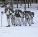 Cold-Weather Operations Course Class 18-06 students practice snowshoeing at Fort McCoy