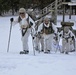 Cold-Weather Operations Course Class 18-06 students practice snowshoeing at Fort McCoy