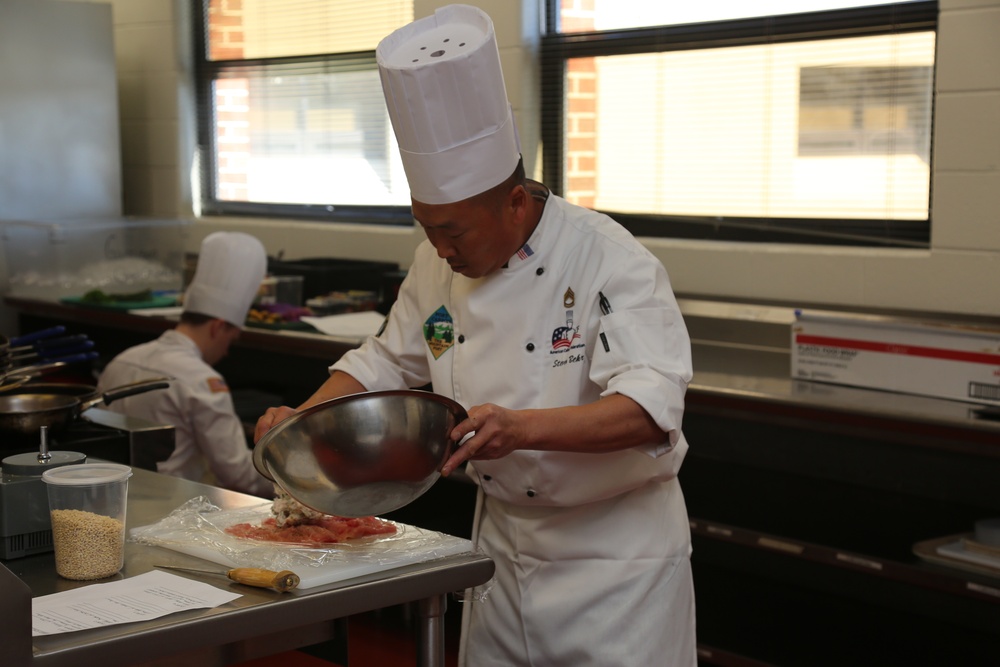 Sgt. First Class Steven Behr Fort Carson Culinary Team preps his Chef of the Year dish