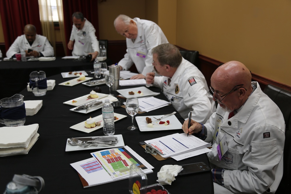 ACF Judges test and critique deserts menu items during Chef of the Year exercise at the Joint Culinary Center of Excellence