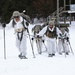 Cold-Weather Operations Course Class 18-06 students practice snowshoeing at Fort McCoy