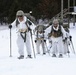 Cold-Weather Operations Course Class 18-06 students practice snowshoeing at Fort McCoy