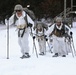 Cold-Weather Operations Course Class 18-06 students practice snowshoeing at Fort McCoy