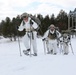 Cold-Weather Operations Course Class 18-06 students practice snowshoeing at Fort McCoy