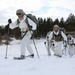 Cold-Weather Operations Course Class 18-06 students practice snowshoeing at Fort McCoy