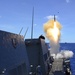 USS Mustin (DDG 89) launches SM-2 rocket during MISSILEX exercise for MultiSail 18