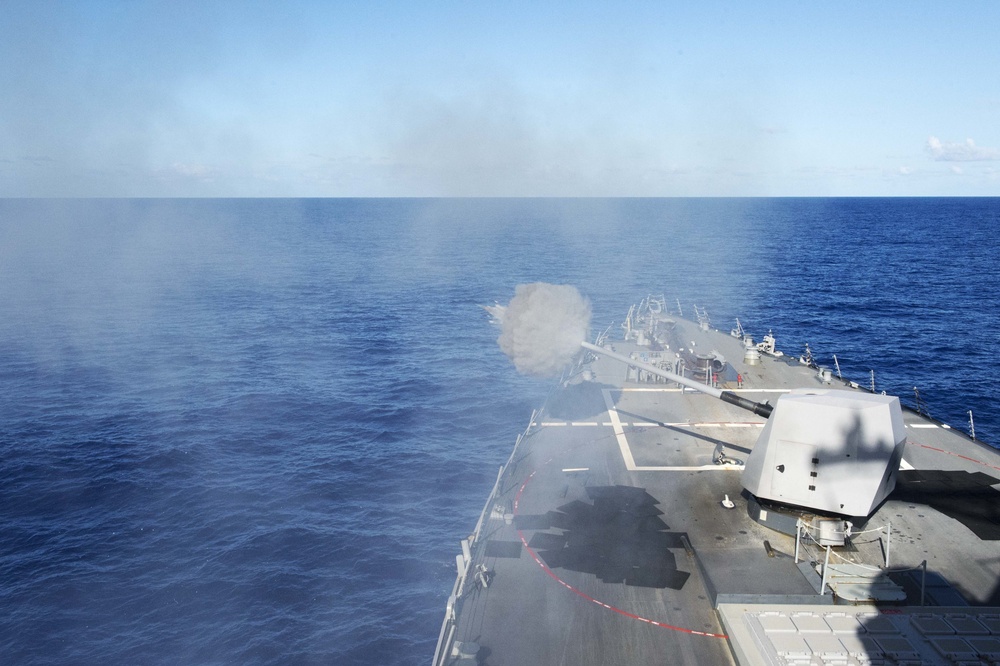 USS Mustin fires the 5-inch gun during MultiSail 18