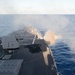 USS Mustin (DDG 89) fires the 5-inch gun during MultiSail 18