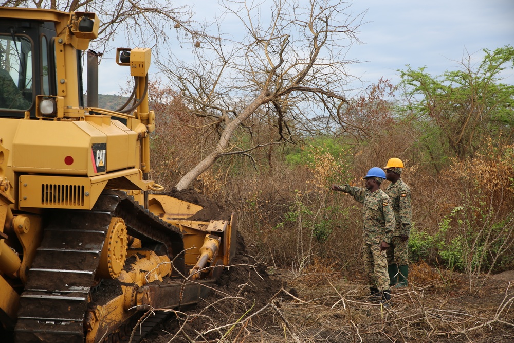 SPMAGTF-CR-AF service members train UPDF soldiers