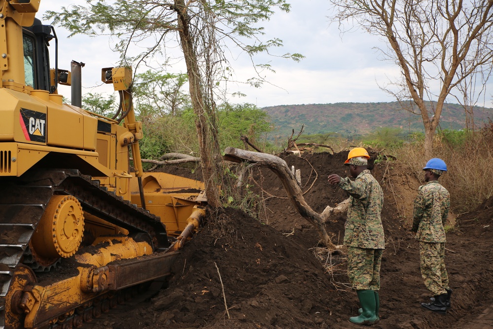 SPMAGTF-CR-AF service members train UPDF soldiers