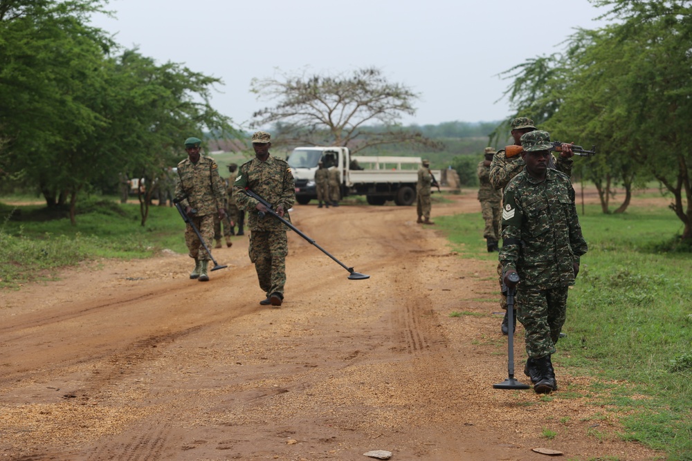 SPMAGTF-CR-AF service members train UPDF soldiers