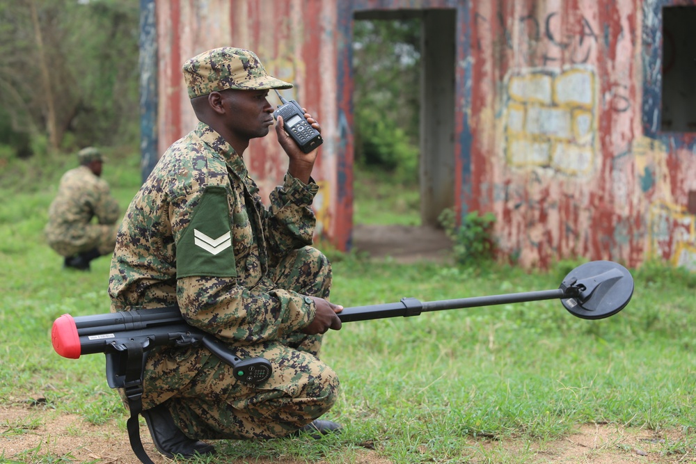 SPMAGTF-CR-AF service members train UPDF soldiers