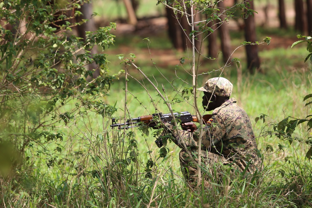 SPMAGTF-CR-AF service members train UPDF soldiers