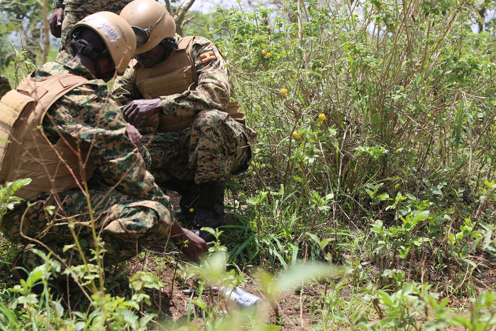 SPMAGTF-CR-AF service members train UPDF soldiers