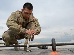 455 ECES Airman powers the mission