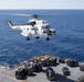 USS Bonhomme Richard (LHD 6) participates in a replenishment-at-sea
