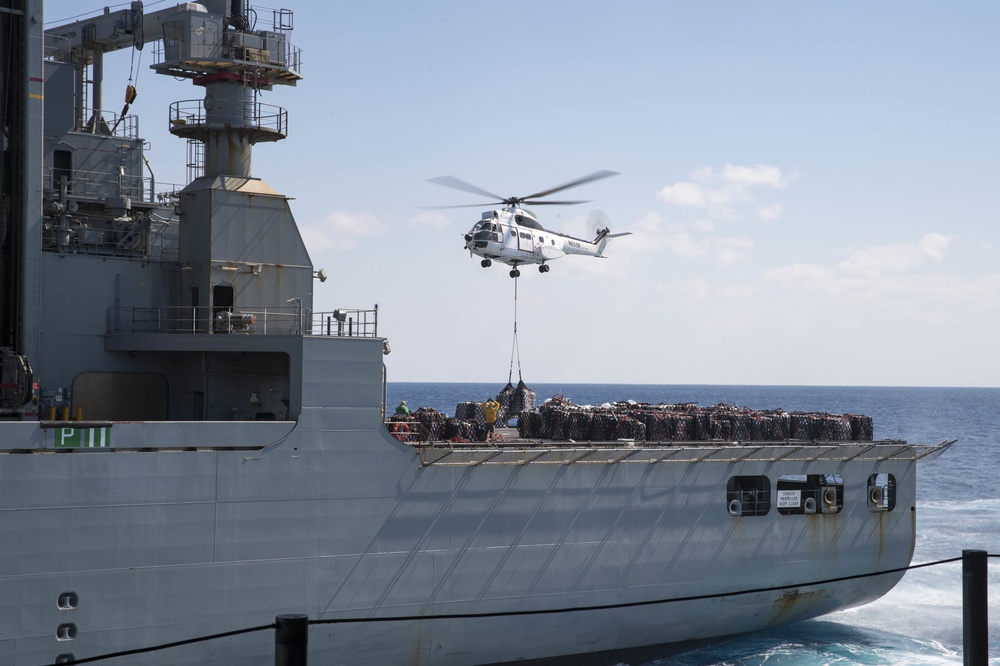 USS Bonhomme Richard (LHD 6) participates in a replenishment-at-sea