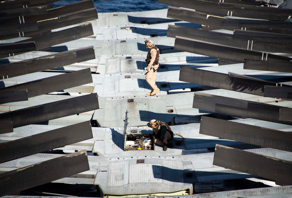 VMM 162 Marines Perform Maintenance aboard USS Iwo Jima