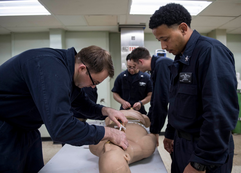 Sailors conduct a tactical combat casulaty combat readines course aboard USNS Mercy