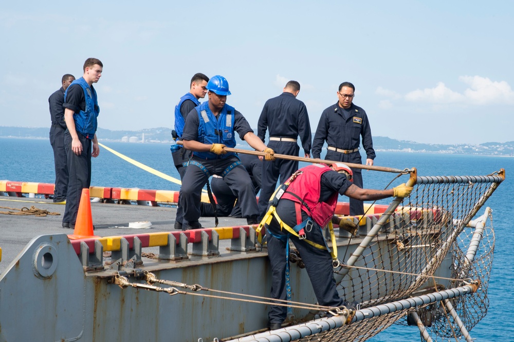 USS Bonhomme Richard (LHD 6) departs White Beach Naval Facility