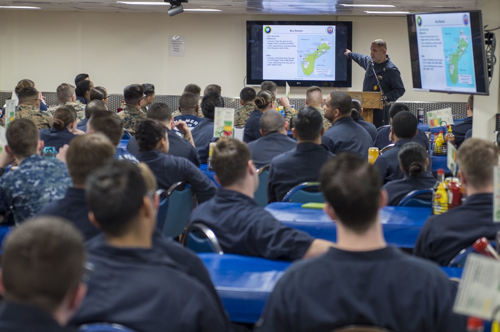 Sailors aboard USNS Mercy attend a port brief