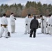 Cold-Weather Operations Course Class 18-06 students build Arctic tents during training at Fort McCoy