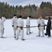 Cold-Weather Operations Course Class 18-06 students build Arctic tents during training at Fort McCoy