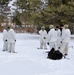 Cold-Weather Operations Course Class 18-06 students build Arctic tents during training at Fort McCoy