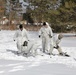 Cold-Weather Operations Course Class 18-06 students build Arctic tents during training at Fort McCoy