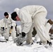 Cold-Weather Operations Course Class 18-06 students build Arctic tents during training at Fort McCoy